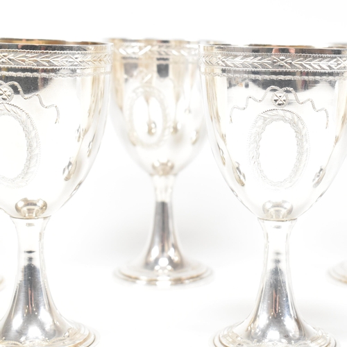 14 - Six 1970's hallmarked silver goblets. The six goblets each standing on a circular stepped plinth bas... 