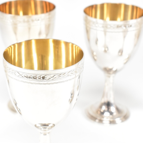 14 - Six 1970's hallmarked silver goblets. The six goblets each standing on a circular stepped plinth bas... 