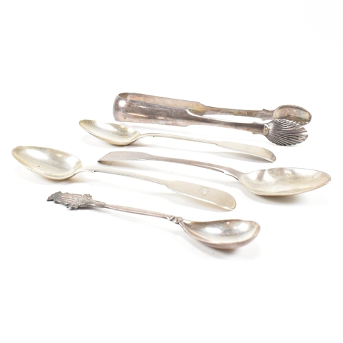 143 - A collection of hallmarked silver items. The lot to include a pair of George III sugar tongs. The Ge... 