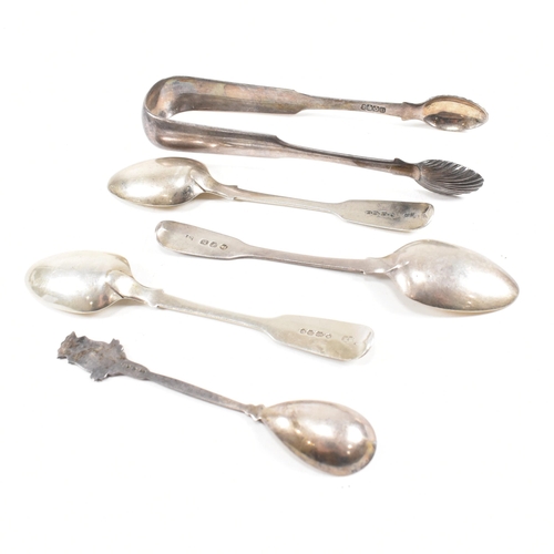 143 - A collection of hallmarked silver items. The lot to include a pair of George III sugar tongs. The Ge... 