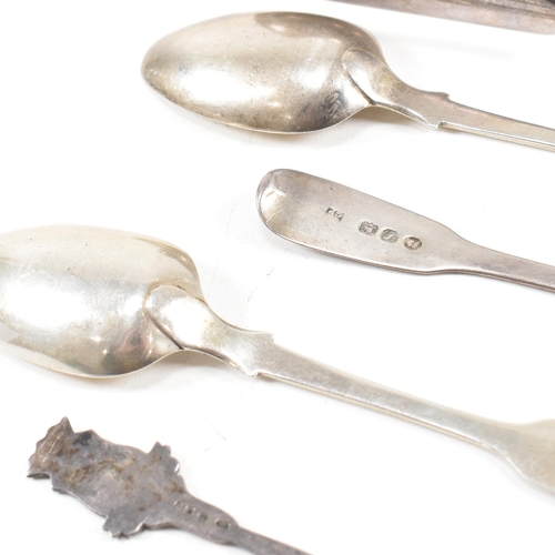 143 - A collection of hallmarked silver items. The lot to include a pair of George III sugar tongs. The Ge... 