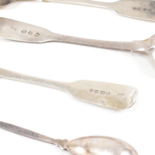 143 - A collection of hallmarked silver items. The lot to include a pair of George III sugar tongs. The Ge... 