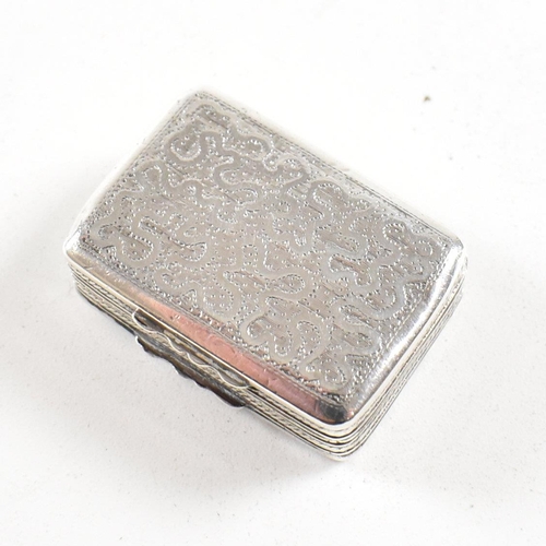 147 - A George IV hallmarked silver vinaigrette. The Georgian vinaigrette having a floral repousse design ... 