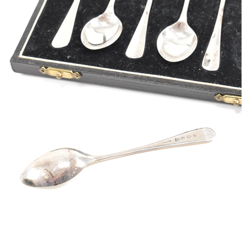 148 - Two cased sets of mid-century hallmarked silver tea spoons. The lot to include a cased set of six te... 