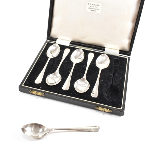 148 - Two cased sets of mid-century hallmarked silver tea spoons. The lot to include a cased set of six te... 