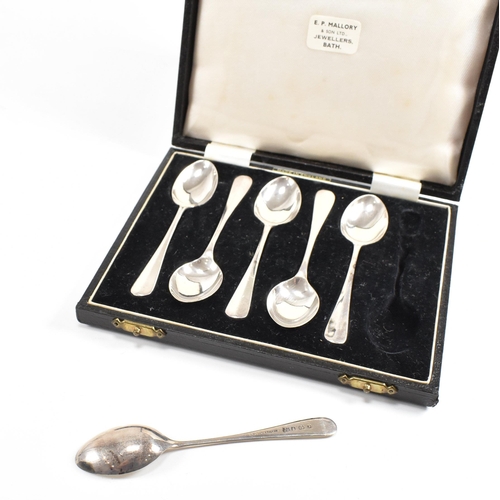 148 - Two cased sets of mid-century hallmarked silver tea spoons. The lot to include a cased set of six te... 