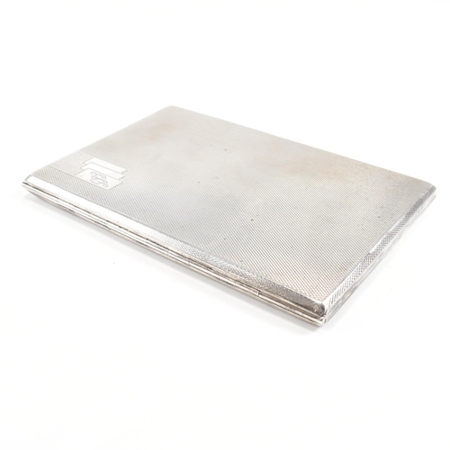 149 - A George V Hallmarked silver cigarette case. The case having an engine turned finish with monogramme... 