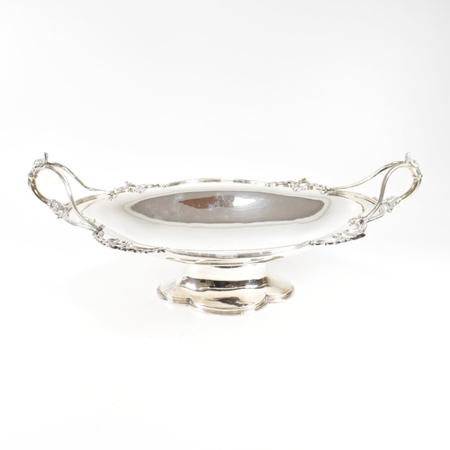 154 - A George V hallmarked silver fruit bowl. The bowl having a plinth base raising to oval form with rel... 