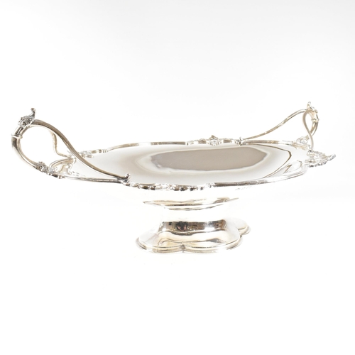 154 - A George V hallmarked silver fruit bowl. The bowl having a plinth base raising to oval form with rel... 