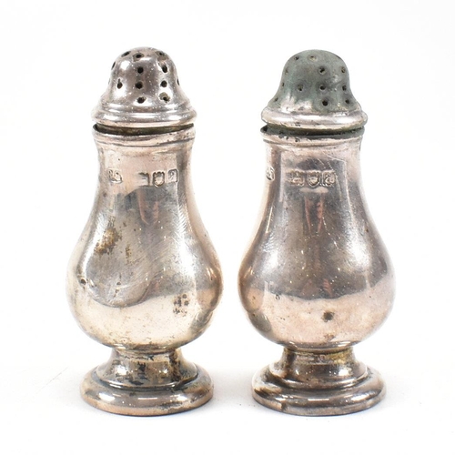 157 - A Victorian cased hallmarked silver cruet set. The set comprising of a salt and pepper shaker each o... 