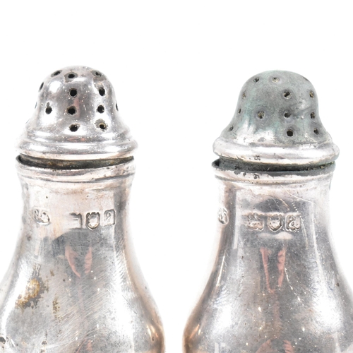 157 - A Victorian cased hallmarked silver cruet set. The set comprising of a salt and pepper shaker each o... 