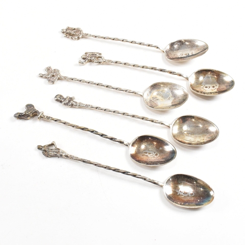 158 - An early 20th century cased set of Apostle spoons and late 19th century cased set of souvenir spoons... 