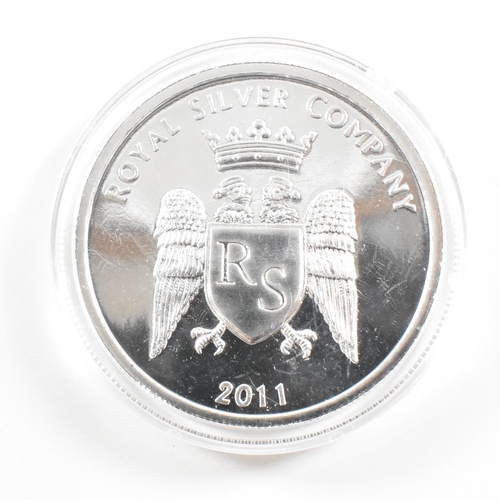 169 - Aÿ one oz 2011 Royal Silver Company coin. The coin being marked .99999 extra fine silver. The coin h... 