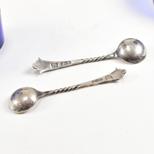 176 - A late 19th Century and hallmarked silver items. The lot to include a pair of hallmarked silver salt... 