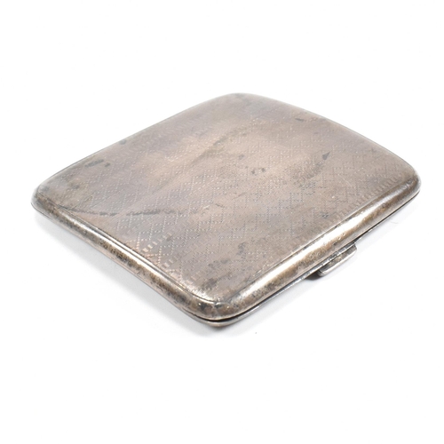 188 - A 1920s hallmarked silver cigarette case and a silver ashtray. The George V cigarette case having an... 