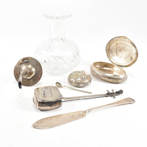 191 - A collection of silver items. The lot to include a hallmarked silver topped glass oil pourer Hallmar... 