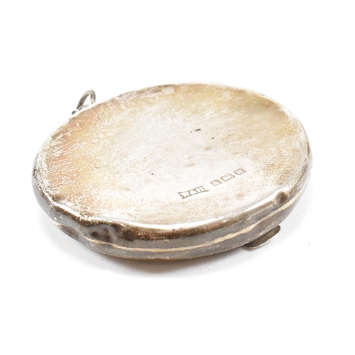 197 - A 1930s hallmarked silver compact. The compact with monogram to lid hallmarked 1932. Makers Mark W&H... 