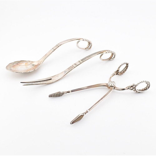 199 - Georg Jensen - A collection of early 20th century silver items from the Georg Jensen Ornamental coll... 