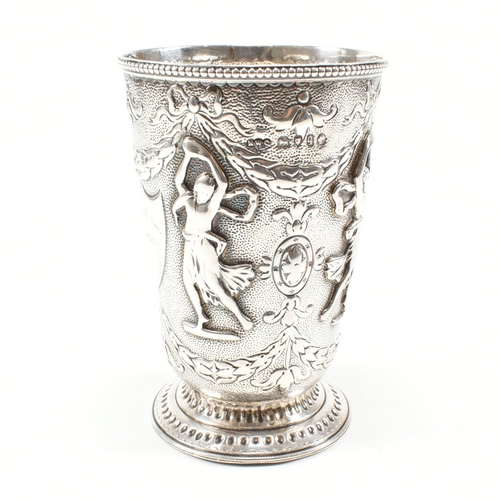 200 - A 19th century Victorian silver mug cast in relief with figures, swag and harebell surrounding an ar... 