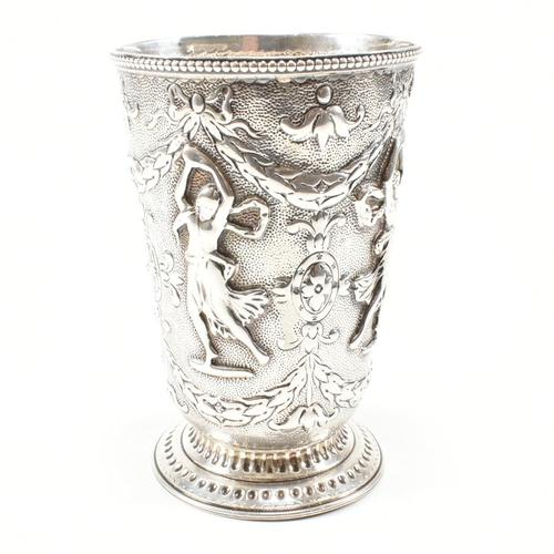 200 - A 19th century Victorian silver mug cast in relief with figures, swag and harebell surrounding an ar... 