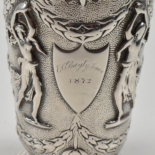 200 - A 19th century Victorian silver mug cast in relief with figures, swag and harebell surrounding an ar... 