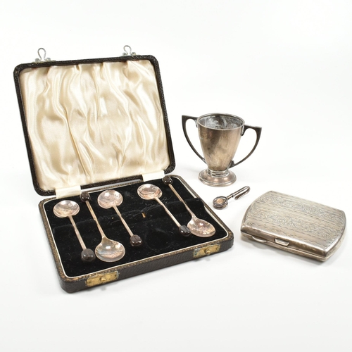 201 - A selection of early to mid century silver items. The lot to include a silver hallmarked cigarette c... 