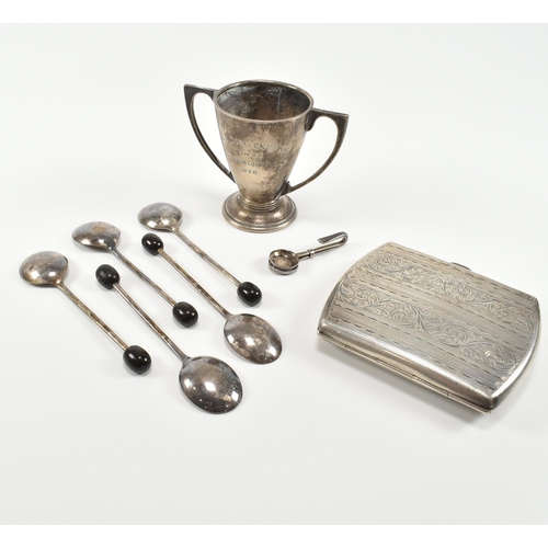 201 - A selection of early to mid century silver items. The lot to include a silver hallmarked cigarette c... 