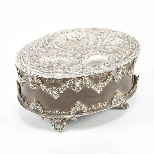 205 - A Victorian hallmarked silver and tortoiseshell trinket jewellery box. The box having a repouss dec... 