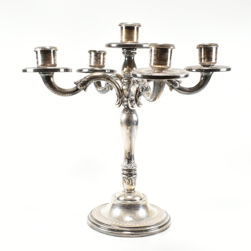 208 - A continental 800 silver five arm candelabra. The candelabra having acanthus leaf decoration to the ... 