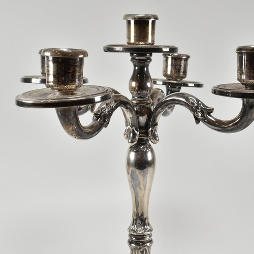 208 - A continental 800 silver five arm candelabra. The candelabra having acanthus leaf decoration to the ... 