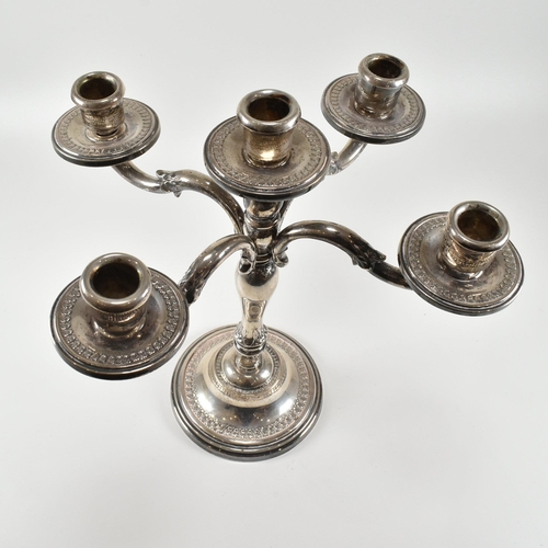 208 - A continental 800 silver five arm candelabra. The candelabra having acanthus leaf decoration to the ... 