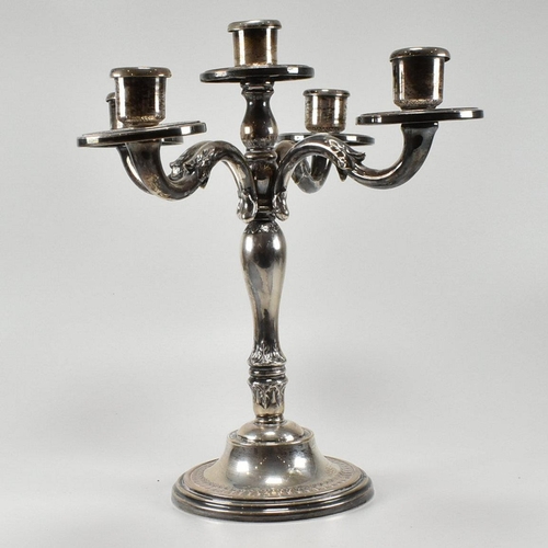 208 - A continental 800 silver five arm candelabra. The candelabra having acanthus leaf decoration to the ... 