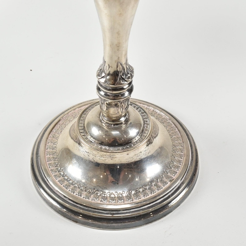 208 - A continental 800 silver five arm candelabra. The candelabra having acanthus leaf decoration to the ... 