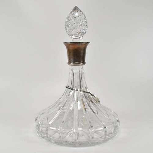 209 - A silver mounted ships decanter complete with stopper and decanter label. Hallmarked Robert Carr (RC... 