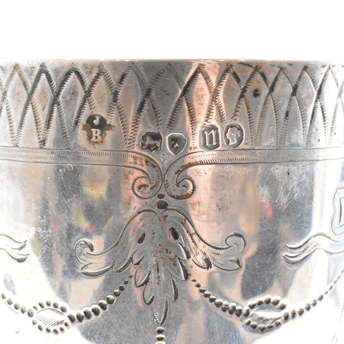 21 - A Victorian hallmarked silver goblet trophy. The goblet having a circular plinth base with baluster ... 