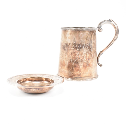 29 - A Victorian hallmarked silver tankard and later dish. The Victorian tankard having a beaded border r... 