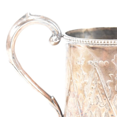 29 - A Victorian hallmarked silver tankard and later dish. The Victorian tankard having a beaded border r... 