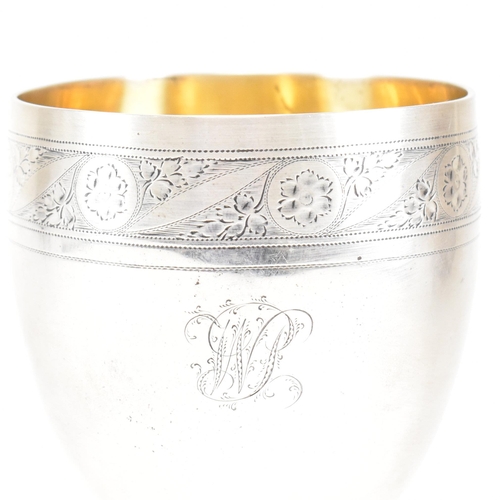 31 - A George III hallmarked silver goblet. The early 19th century goblet having a square plinth base ris... 