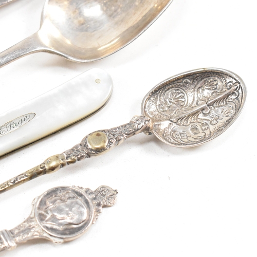 32 - A collection of hallmarked silver items. The lot to include a George VI table spoon, hallmarked for ... 