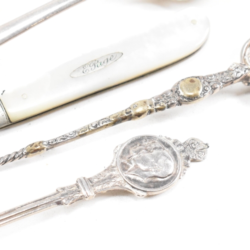 32 - A collection of hallmarked silver items. The lot to include a George VI table spoon, hallmarked for ... 