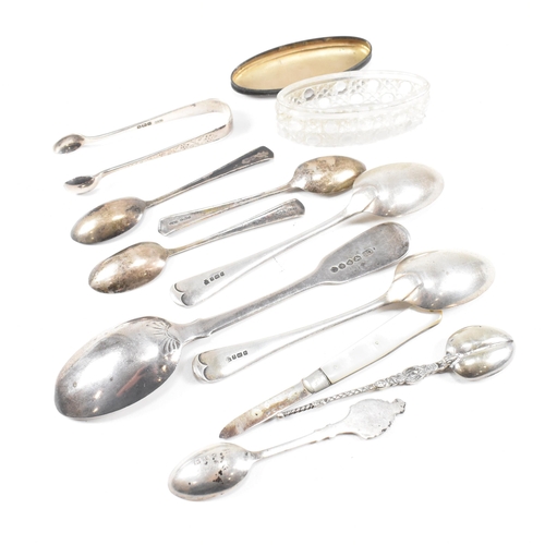 32 - A collection of hallmarked silver items. The lot to include a George VI table spoon, hallmarked for ... 