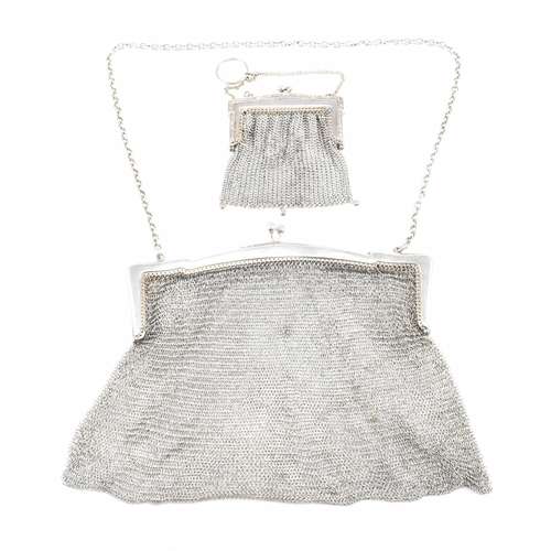 34 - George V hallmarked silver mesh bag and white metal coin purse.ÿThe bag stamped 925 with import mark... 