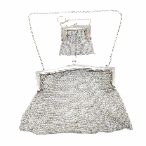 34 - George V hallmarked silver mesh bag and white metal coin purse.ÿThe bag stamped 925 with import mark... 