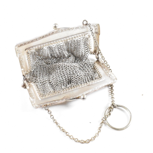 34 - George V hallmarked silver mesh bag and white metal coin purse.ÿThe bag stamped 925 with import mark... 