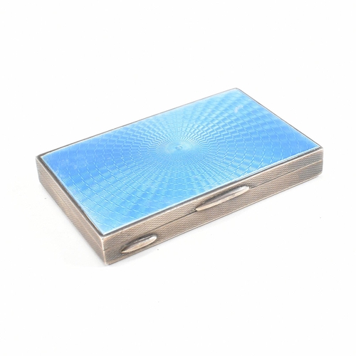 35 - An Art Deco hallmarked silver and guilloche enamel compact and cigarette case.ÿ The lot to include a... 