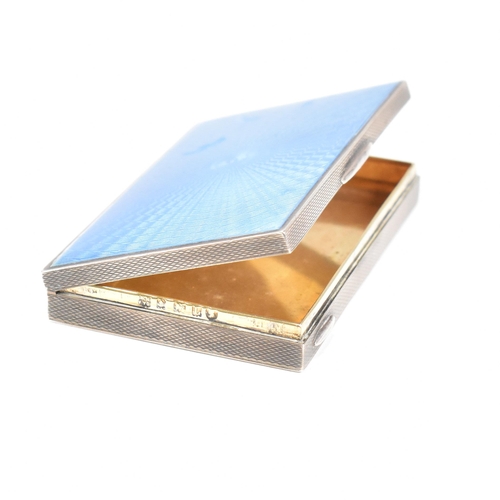 35 - An Art Deco hallmarked silver and guilloche enamel compact and cigarette case.ÿ The lot to include a... 