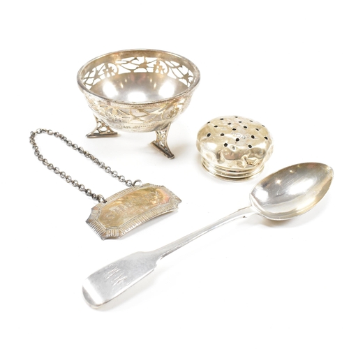 40 - A collection of hallmarked silver items. The lot to include a trinket dish. The dish being raised on... 