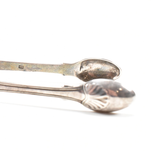 41 - One pair of Victorian and one pair of George IV hallmarked silver sugar tongs. Both tongs having mou... 