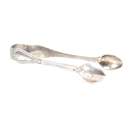 41 - One pair of Victorian and one pair of George IV hallmarked silver sugar tongs. Both tongs having mou... 