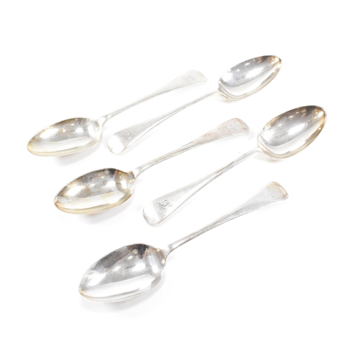 50 - A collection of five George V hallmarked silver table spoons.ÿThe five spoons having a fiddle patter... 